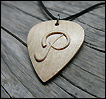 Plectrum, with a letter